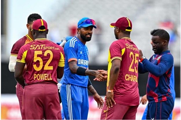 Cricket players shaking hands after a match