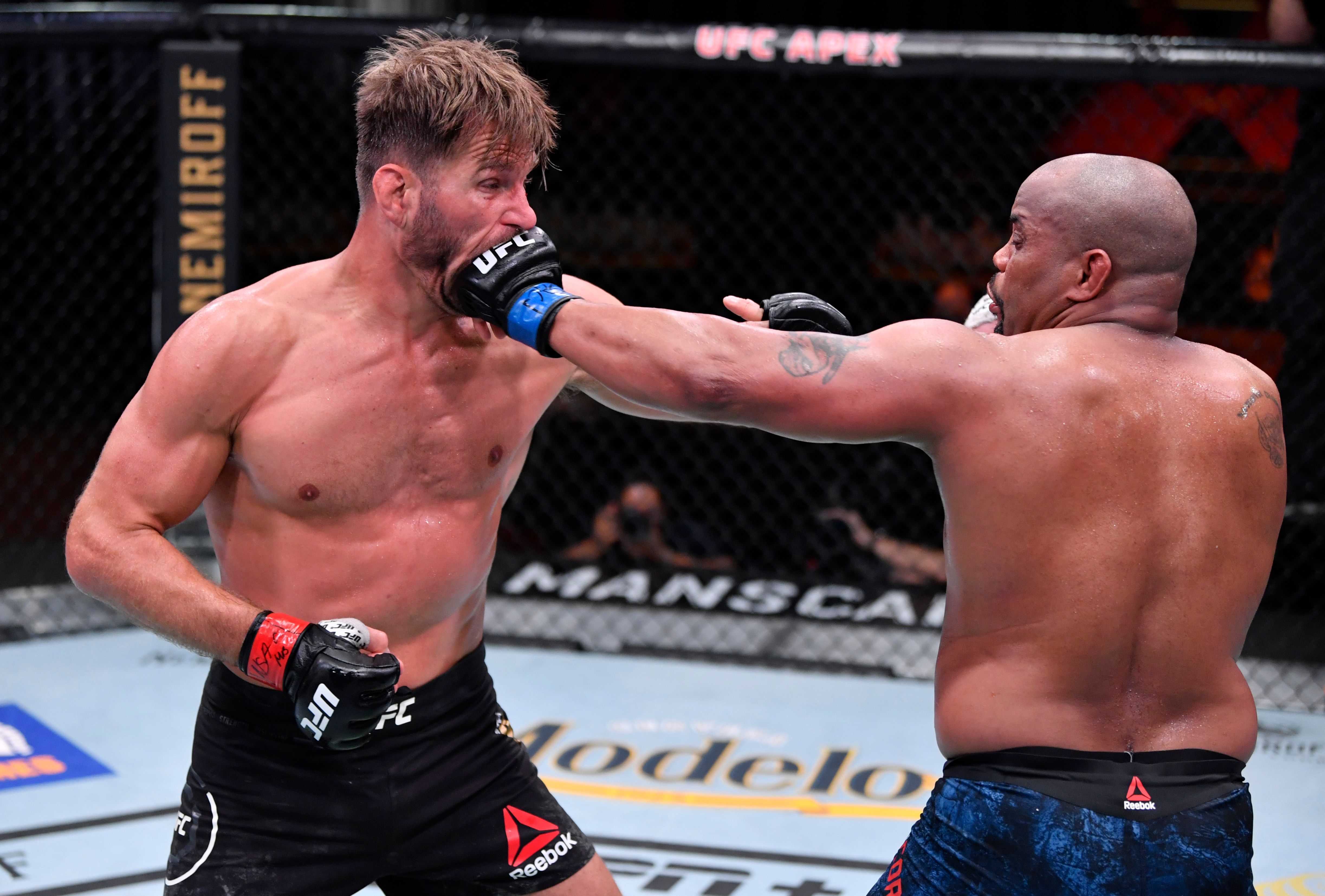 Daniel Cormier punches Stipe Miocic