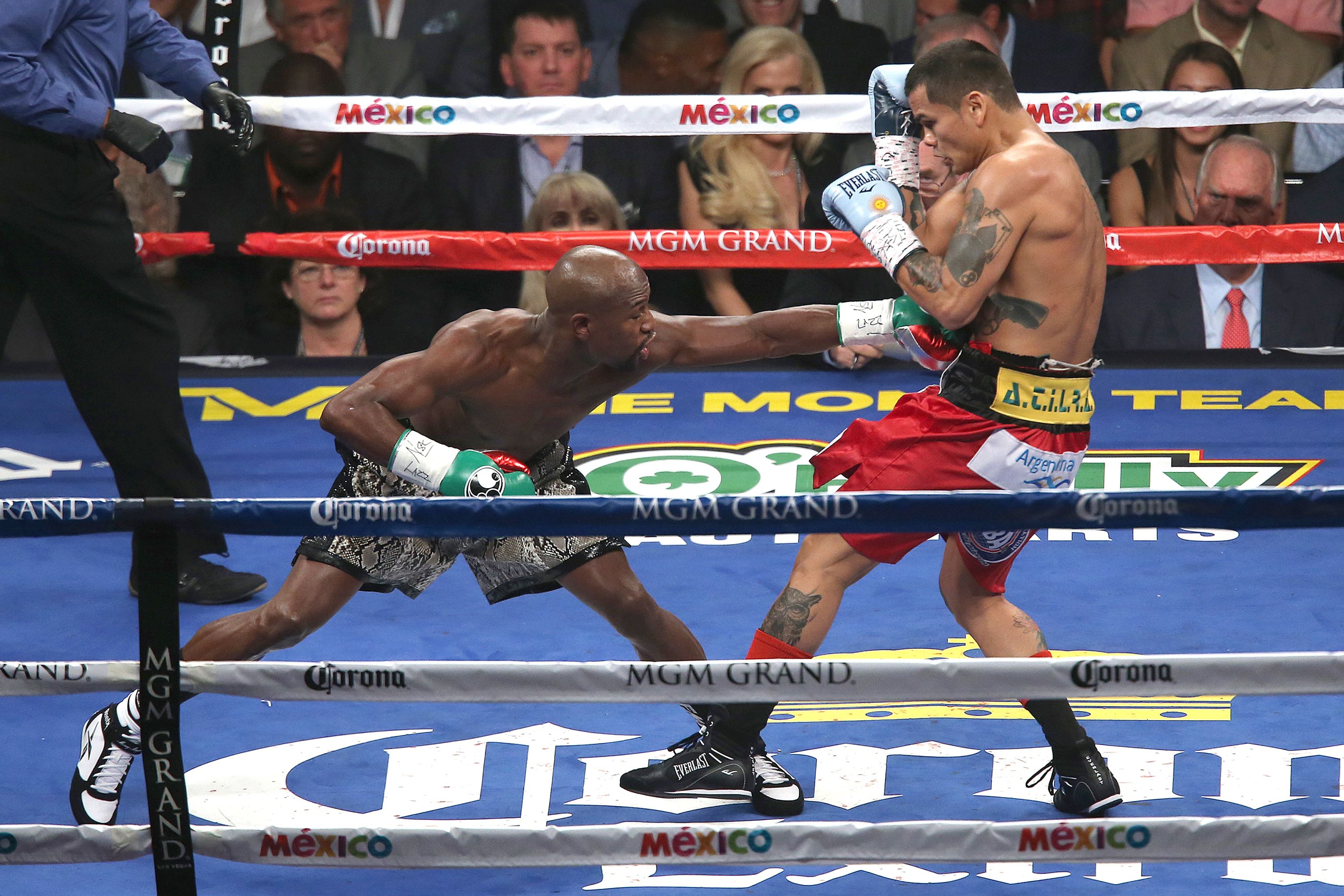 Floyd Mayweather Jr. throws a jab at Marcos Maidana