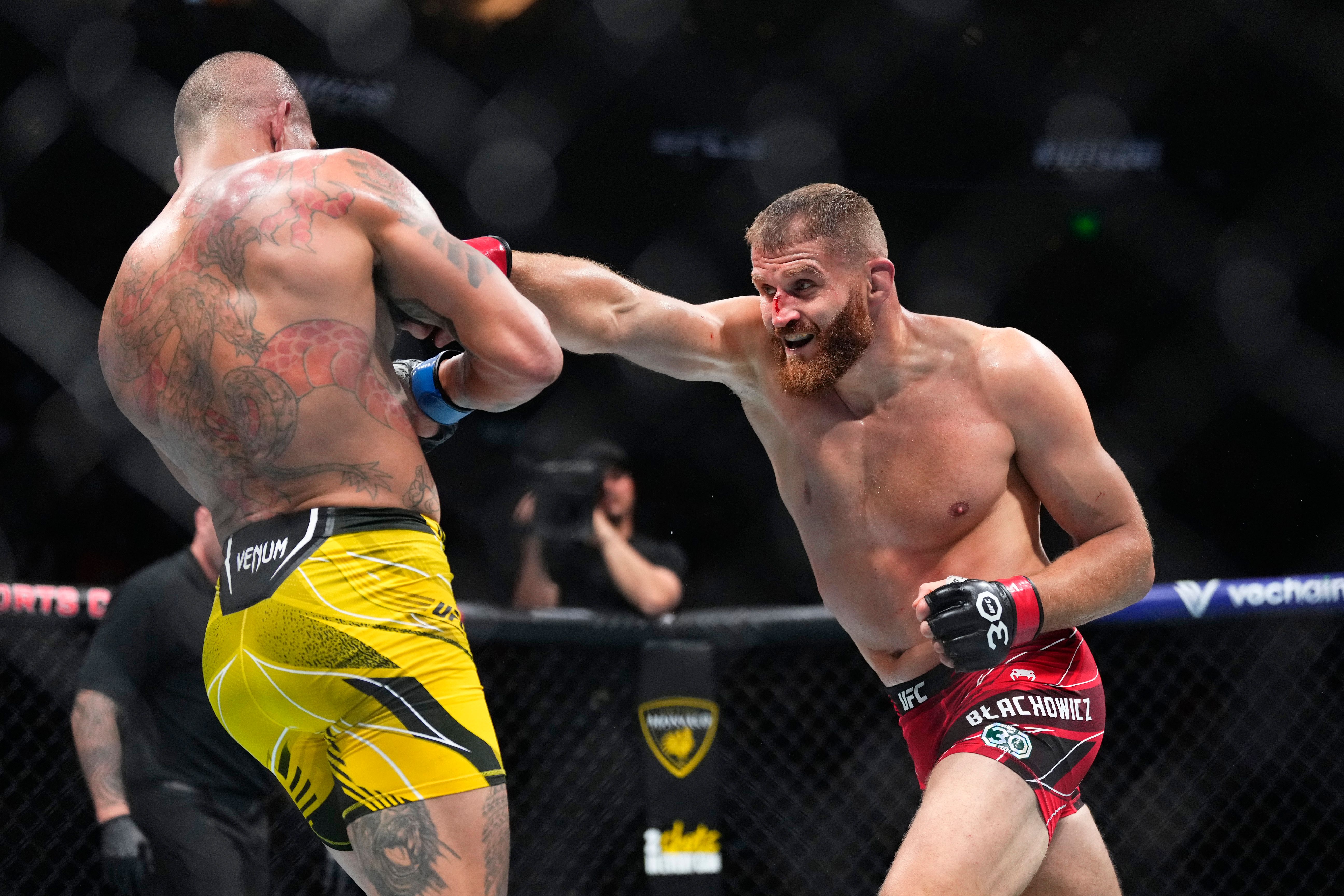 Jan Blachowicz of Poland punches Alex Pereira of Brazil