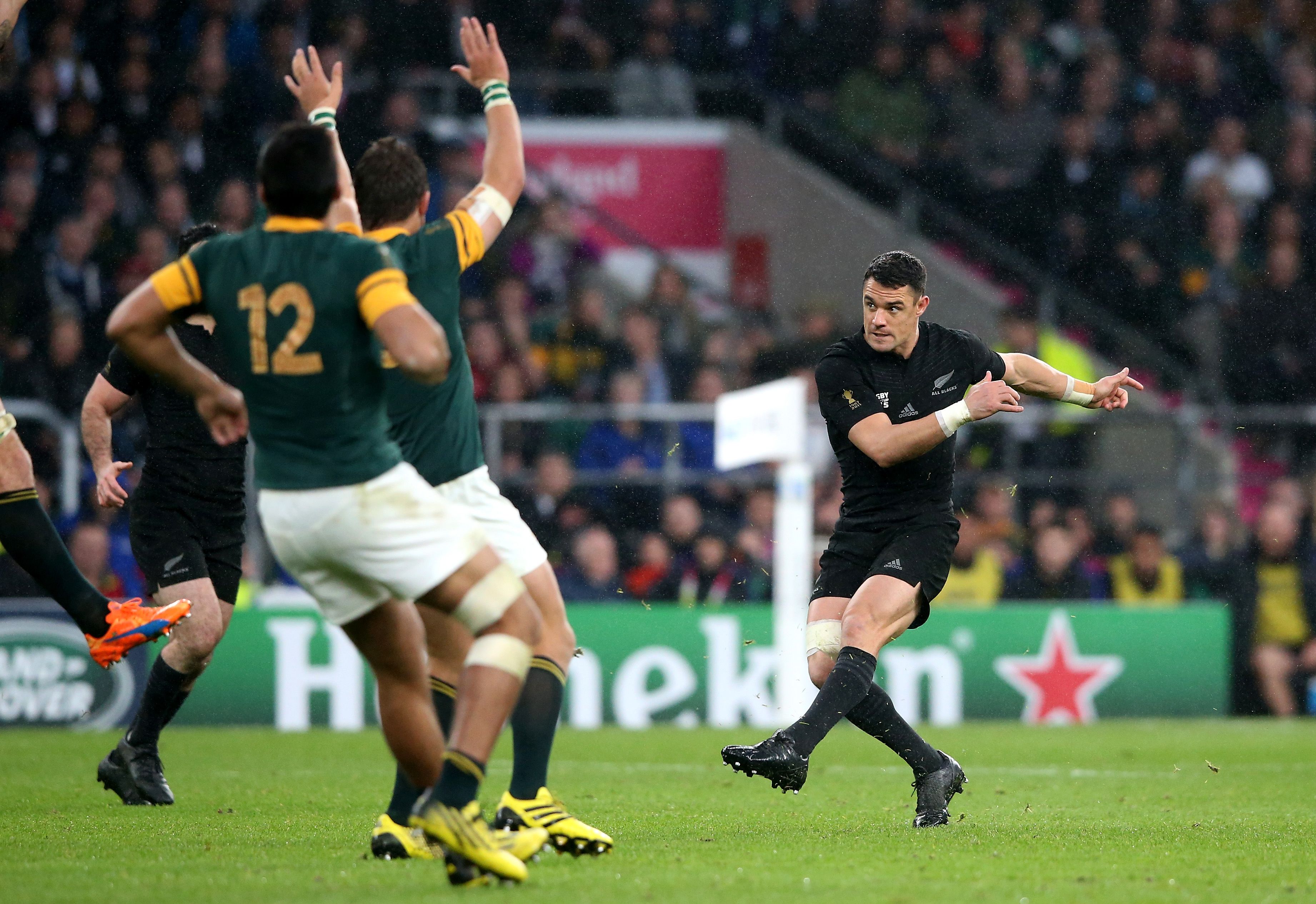Dan Carter of the New Zealand All Blacks kicks a drop goal
