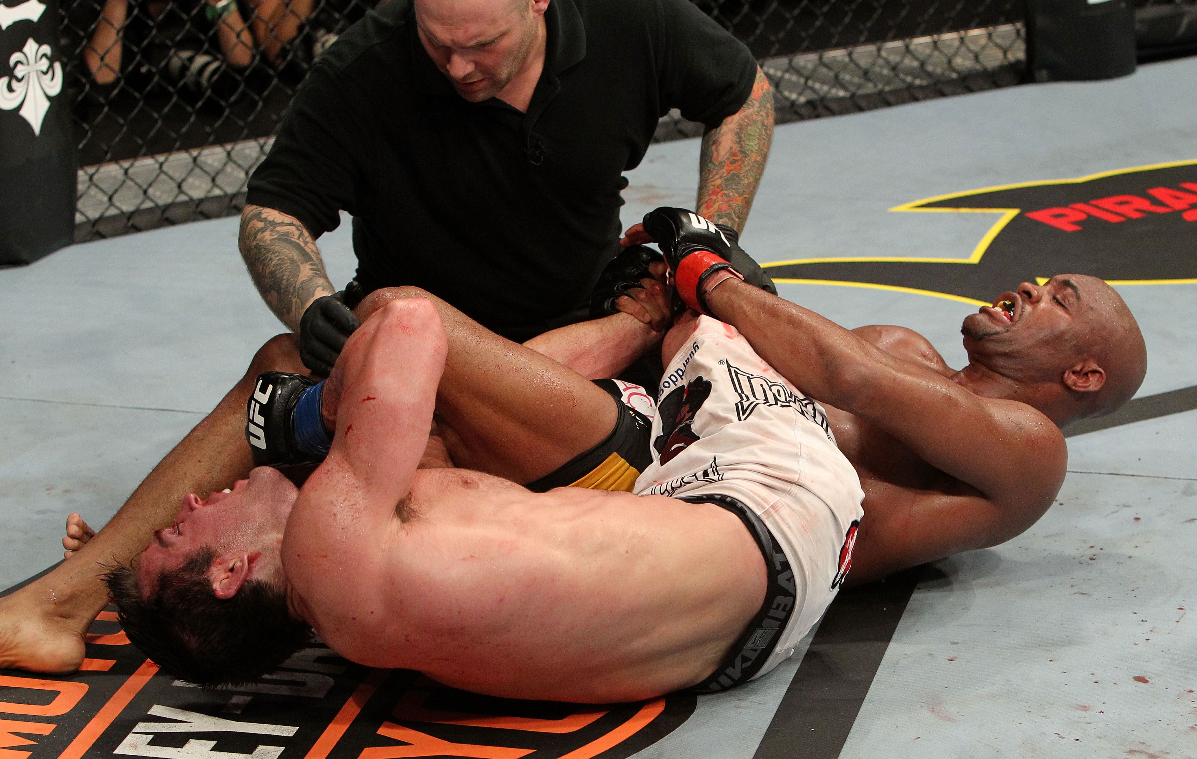 Referee Josh Rosenthal, Chael Sonnen and Anderson Silva