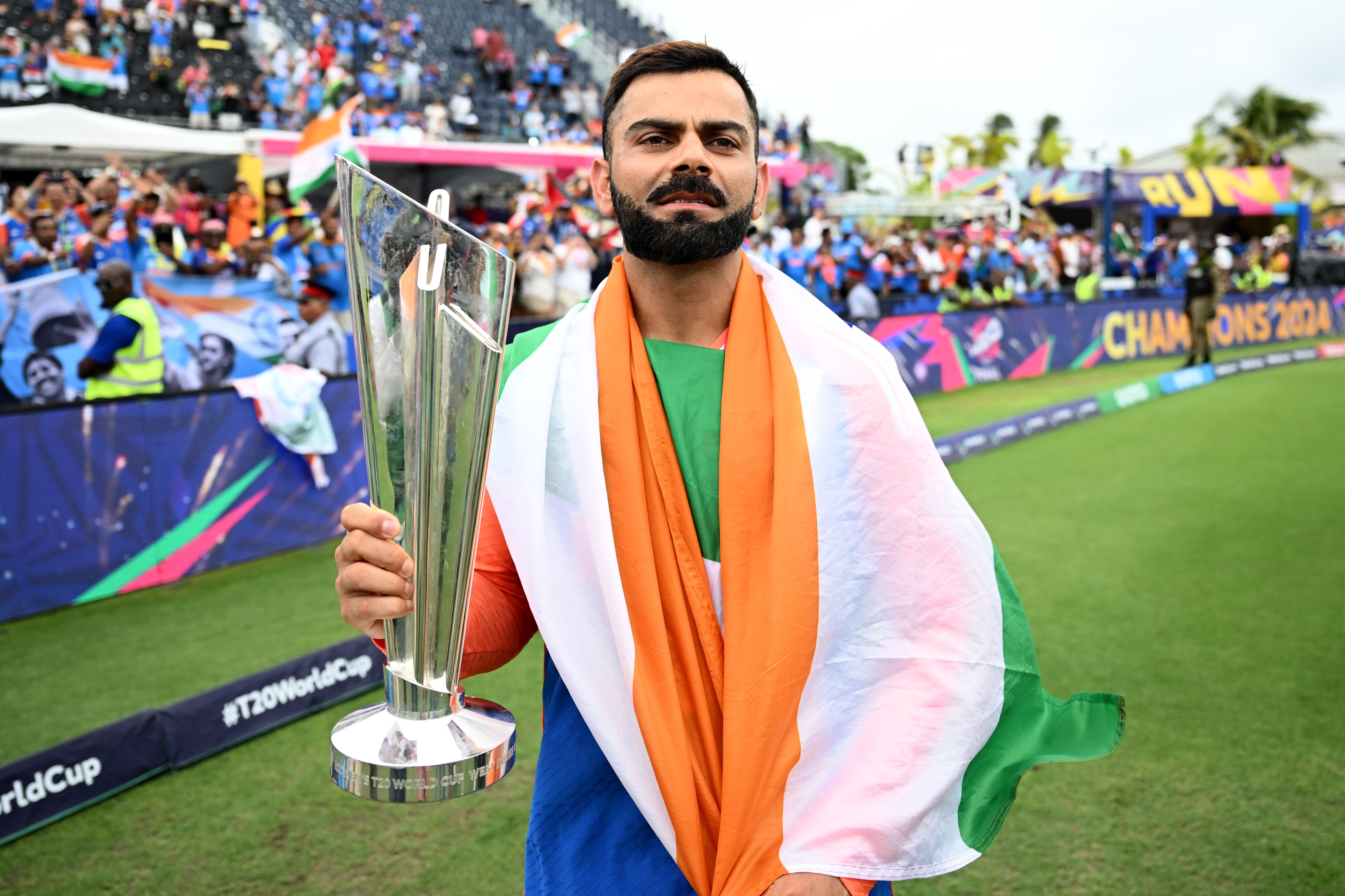 Virat Kohli of India celebrates with the ICC Men's T20 Cricket World Cup 